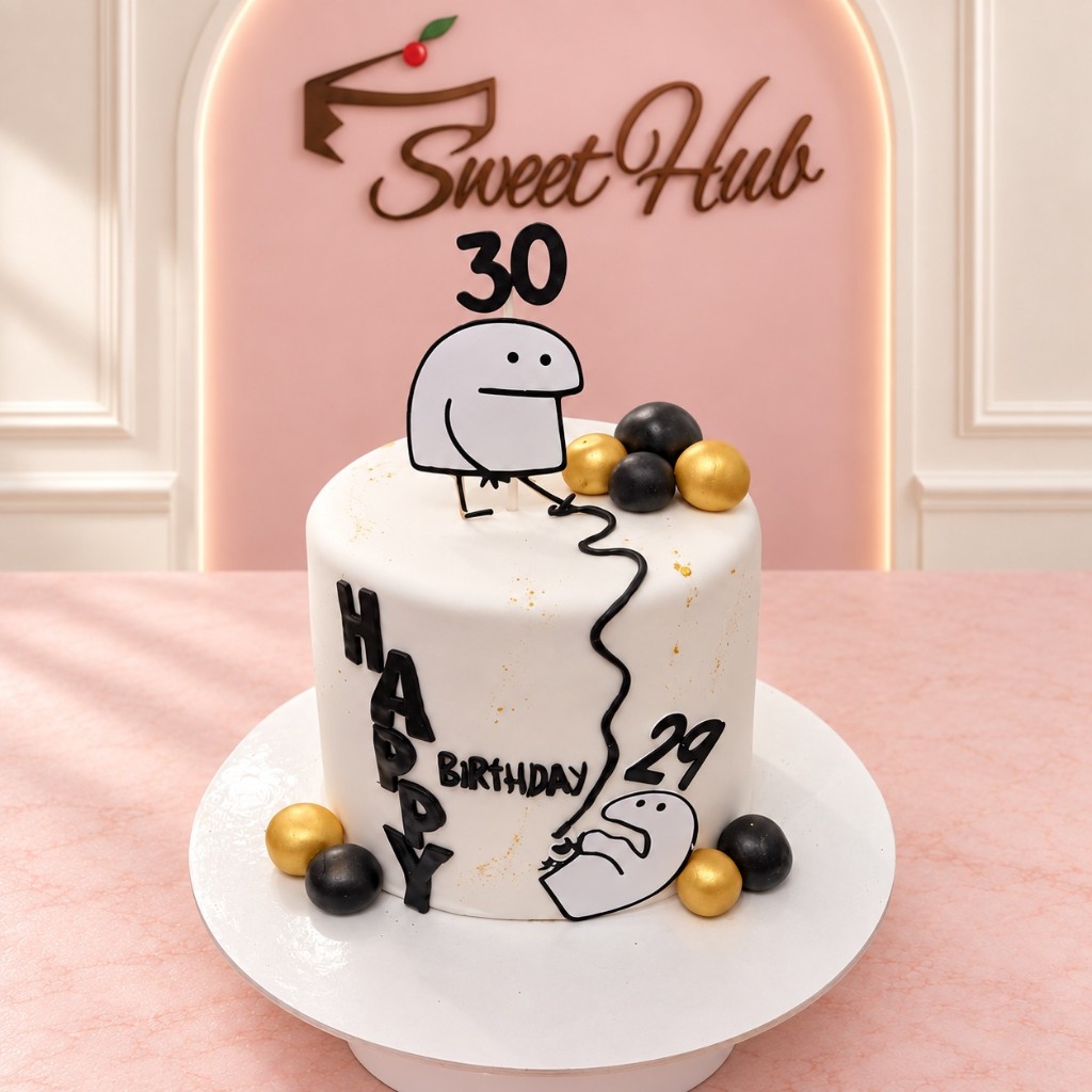 A white birthday cake made by Sweet Hub, marked 30, with a cartoon figure and gold and black spheres